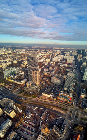 WARSAW, POLAND - NOVEMBER 27, 2018: Beautiful panoramic aerial drone view to the center of Warsaw City and The Warsaw Trade Tower (WTT) - skyscraper along with the Palace of Culture and Scienceのeditorial素材
