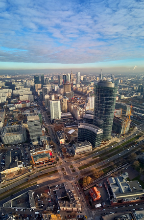 WARSAW, POLAND - NOVEMBER 27, 2018: Beautiful panoramic aerial drone view to the center of Warsaw City and The Warsaw Spire - 220 metre neomodern office building on European square (Plac Europejski)のeditorial素材