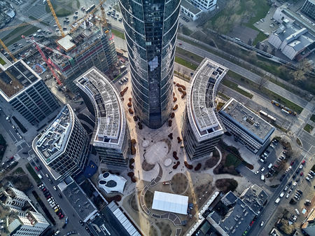 WARSAW, POLAND - NOVEMBER 27, 2018: Beautiful panoramic aerial drone view to the center of Warsaw City and The Warsaw Spire - 220 metre neomodern office building on European square (Plac Europejski)のeditorial素材