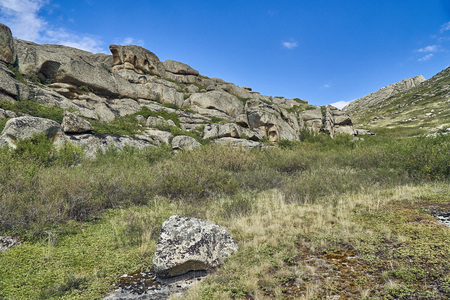 Beautiful panoramic summer steppe landscape of stone mountainsの写真素材