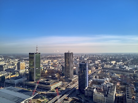 WARSAW, POLAND - FEBRUARY 23, 2019: Beautiful panoramic aerial drone view to the center of Warsaw City and hotel Marriott and railway station Warszawa Centralnaのeditorial素材