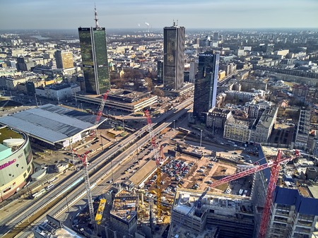 WARSAW, POLAND - FEBRUARY 23, 2019: Beautiful panoramic aerial drone view to the center of Warsaw City and hotel Marriott and railway station Warszawa Centralnaのeditorial素材