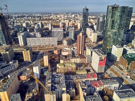 WARSAW, POLAND - FEBRUARY 23, 2019: Beautiful panoramic aerial drone view to panorama cityscape of Warsaw modern City, PKiN and "Rondo 1" office skyscraper located at Rondo ONZのeditorial素材