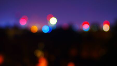 Patterns of defocused street lights - beautiful bokeh on the open aperture of the bright lens, Warsaw, Polandの写真素材