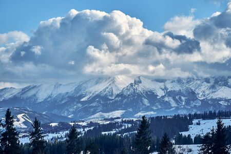 Beautiful panoramic aerial drone view to the Tatra Mountains (Tatras, Tatra) - mountain range between Slovakia and Poland - They are the highest mountain range in the Carpathian Mountains, PLの写真素材
