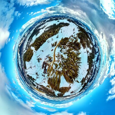 Beautiful panoramic aerial drone view to the ski slopes with lifts in the Bialka Tatrzanska ski resort Tatra Mountains (Tatras, Tatra) - mountain in Poland - 360 spherical panorama, little planet, PLの写真素材