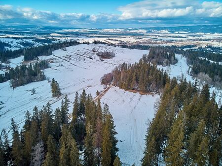 Beautiful panoramic aerial drone view to the ski slopes with lifts in the Bialka Tatrzanska ski resort Tatra Mountains (Tatras, Tatra) - mountain range between Slovakia and Poland, PLの写真素材