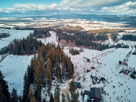 Beautiful panoramic aerial drone view to the ski slopes with lifts in the Bialka Tatrzanska ski resort Tatra Mountains (Tatras, Tatra) - mountain range between Slovakia and Poland, PLの写真素材