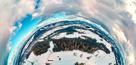 Beautiful panoramic aerial drone view to the ski slopes with lifts in the Bialka Tatrzanska ski resort Tatra Mountains (Tatras, Tatra) - mountain in Poland - 360 spherical panorama, little planet, PLの写真素材