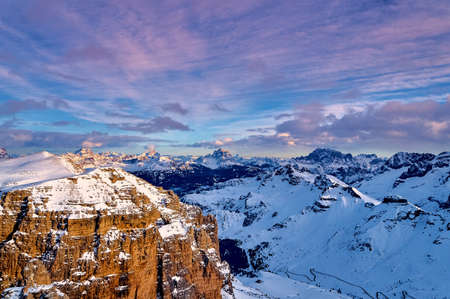 Beautiful panoramic view to the Sellaronda - the largest ski carousel in Europe - skiing the four most famous passes in the Dolomites, Italy; extraordinary snowy peaks of the dolomites, southern alpsの写真素材