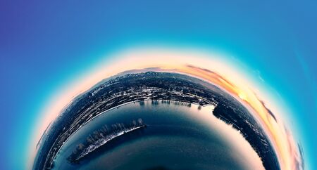 Panoramic aerial view: beautiful spring landscape: the Irtysh river in Kazakhstan wakes up from winter sleep - ice drift - snow and ice are melting at sunset, Qazaqstanの写真素材