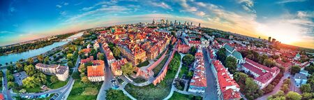 Beautiful panoramic aerial drone view on Warsaw Old town (Stare Miasto) - the oldest district of Warsaw (13th century), square and the Column of Sigismund III Vasa at sunset, Polandの写真素材