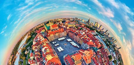Beautiful panoramic aerial drone view (360 spherical panorama little planet)) on Warsaw Old town (POL: (Stare Miasto), square and the Column of Sigismund III Vasa at sunset, Poland.の写真素材