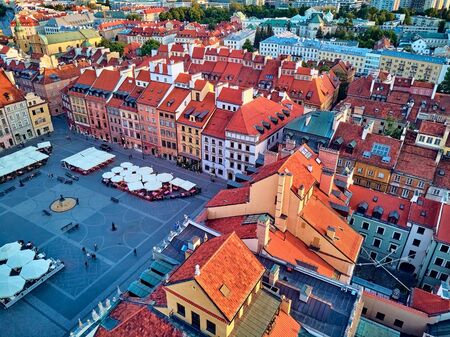 Beautiful panoramic aerial drone view on Warsaw Old town (Stare Miasto) - the oldest district of Warsaw (13th century), square and the Column of Sigismund III Vasa at sunset, Poland