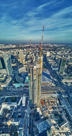 WARSAW, POLAND - NOVEMBER 19, 2020: Beautiful panoramic aerial drone view on Warsaw City Skyscrapers, PKiN, and Varso Tower (the tallest skyscraper in the European Union) under construction, EUのeditorial素材