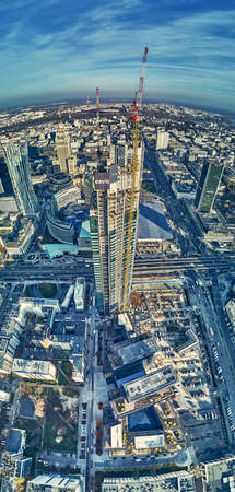 WARSAW, POLAND - NOVEMBER 19, 2020: Beautiful panoramic aerial drone view on Warsaw City Skyscrapers, PKiN, and Varso Tower (the tallest skyscraper in the European Union) under construction, EUのeditorial素材
