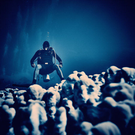 The beauty of the underwater world - diver at depth - scuba diving in the Red Sea, Egypt.