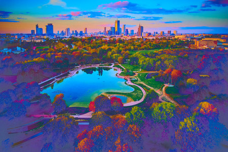 A beautiful panoramic aerial drone view of the sunset at Pola Mokotowskie in Warsaw, Poland - "Mokotow Field" is a large park in Warsaw - Is called "Jozef Pilsudski Park" or "Warsaw Central Park", EUの写真素材