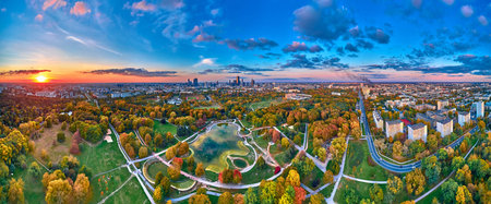 A beautiful panoramic aerial drone view of the sunset at Pola Mokotowskie in Warsaw, Poland - "Mokotow Field" is a large park in Warsaw - Is called "Jozef Pilsudski Park" or "Warsaw Central Park", EUの写真素材