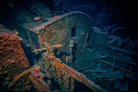 WWII truck inside the ship wreck of SS Thistlegorm - British cargo steamship sunk by German bomber aircraft in the Red Sea in 1941 near Sharm El Sheikh, Egypt. Underwater photography and travel.の写真素材