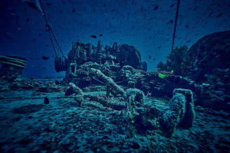 Mysterious underwater view on deck the ship wreck of SS Thistlegorm - British cargo steamship sunk by German bomber in the Red Sea, near Sharm El Sheikh, Egypt. Underwater photography and travel.の写真素材