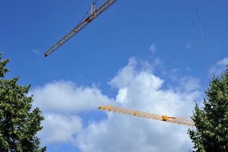 Crane jib against blue skyの写真素材