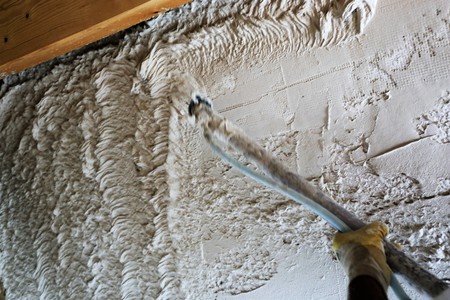 Plastering inside walls with base plaster, machine plasteringの写真素材