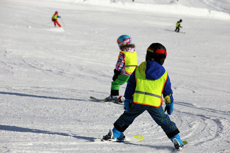 Children in the skiing courseの写真素材