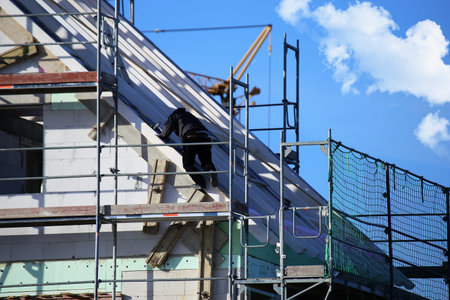 Carpenters working on a roof