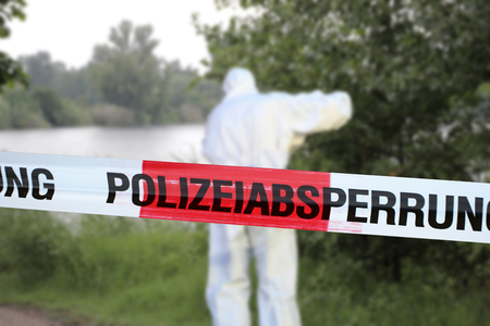 Cordon tape with the word ? ? ?Police Lockout? ?, the german word for police cordonの写真素材