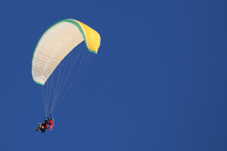 Paraglider tandem flightの写真素材
