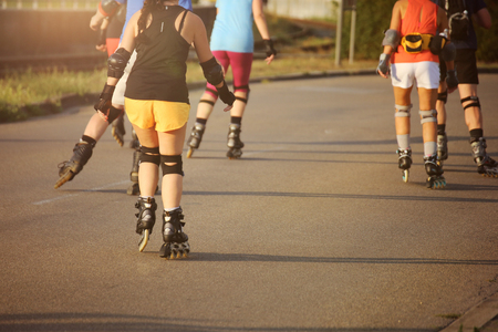 Group of roller blades in the evening sunの写真素材