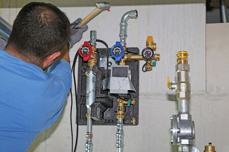 Installing a heating system with alternative energyの写真素材