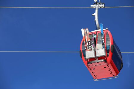 Gondola in winter with blue skyの写真素材