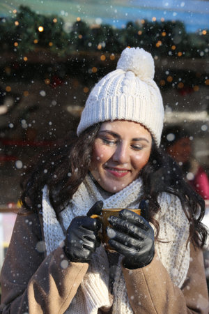 Happy young woman at a christmas market
