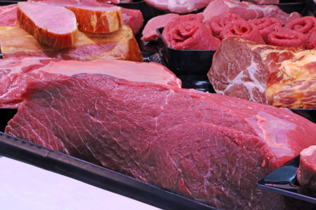 Variety of fine meat products in the butchery