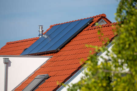 Single family house with solar system or photovoltaic systemの写真素材