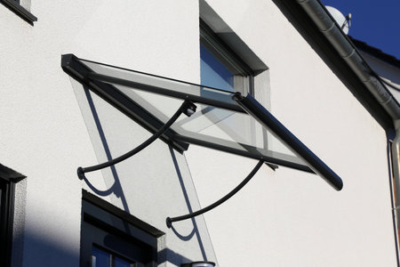 New glass canopy on a residential buildingの写真素材