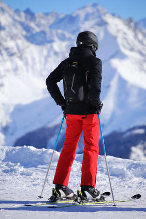 Skis enjoying the view before the next descentの写真素材