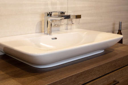 Modern washbasin in a high-quality bathroomの写真素材