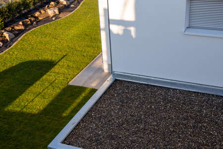 Well-sealed garage roof backfilled with pebblesの写真素材