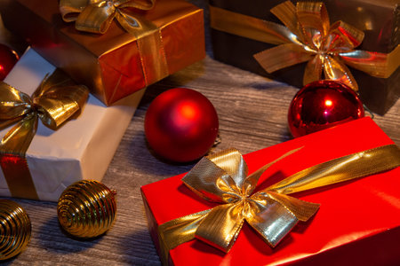 Christmas gift table with presents and Christmas tree baubles