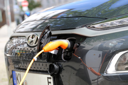 Electric car at the charging station (Kaiserslautern Germany, May 19, 2021)のeditorial素材