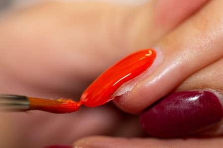 Nail modellage, close-up of a natural nail extensionの写真素材