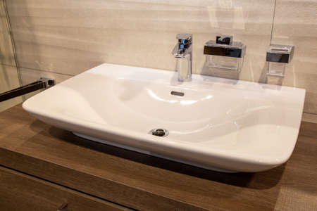 Modern washbasin in a high-quality bathroomの写真素材
