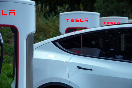 Tesla at a Supercharger in Saulce-sur-Rhone, France (June 09, 2023)のeditorial素材