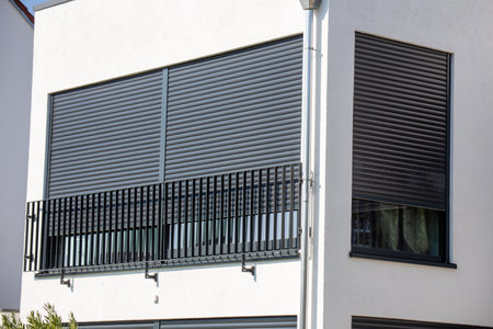 Electric aluminum roller shutter on a new residential buildingの写真素材