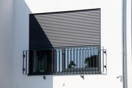 Electric aluminum roller shutter on a new residential buildingの写真素材