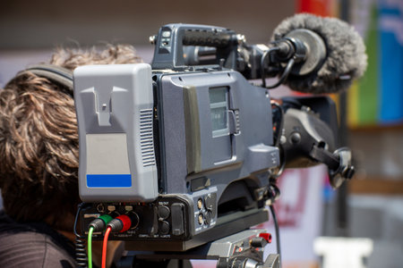 Close-up of a television camera broadcasting an eventの写真素材