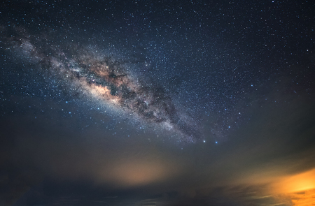 Milky way galaxy at Kudat Sabah Malaysia.(Visible noise due to High ISO, soft focus due to shallow DOF, slight motion blur)の写真素材